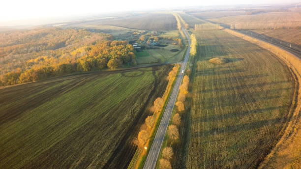 istock Aerial Top View   highway intersection junction summer morning with car 1071710420