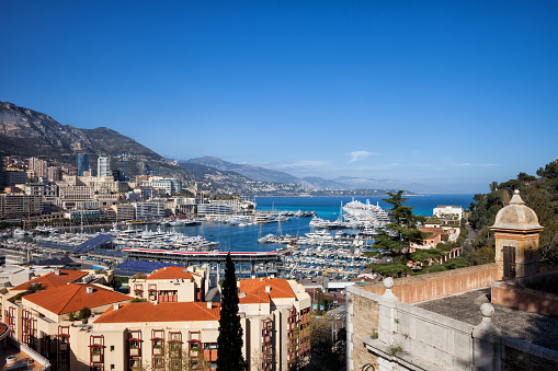 Monaco principality cityscape, view to Monte Carlo and Port Hercule on Mediterranean Sea