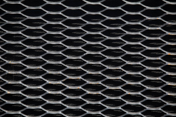 Tractor radiator grille. Tractor radiator grille for design and background. Abstract metallic mesh background. metal grate stock pictures, royalty-free photos & images