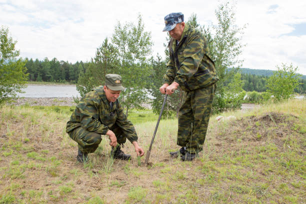 istock The forester grows a tree. Farmers are planting trees. 1071714976