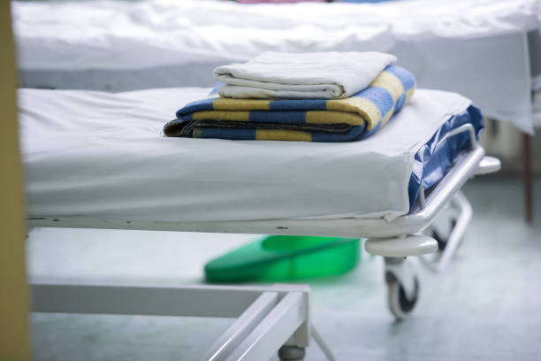 istock Empty Bed On Hospital Ward 1071719380
