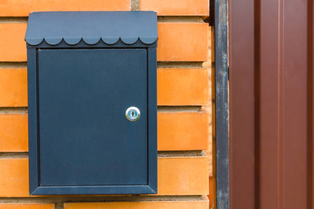 istock A beautiful mailbox hangs waiting for newspapers, parcels and letters. 1071720124