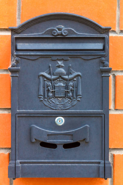istock A beautiful mailbox hangs waiting for newspapers, parcels and letters. 1071720168