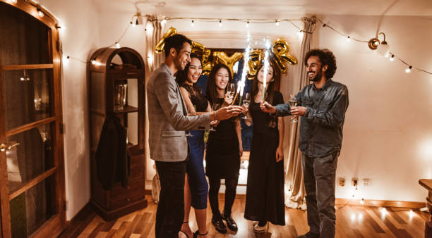 istock friends celebrate the new year toasting 1071721664