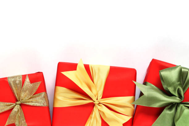 istock Red gift box isolated on white with close-up. 1071724702