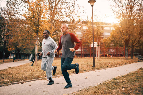 istock Seniors Running In Park 1071724908