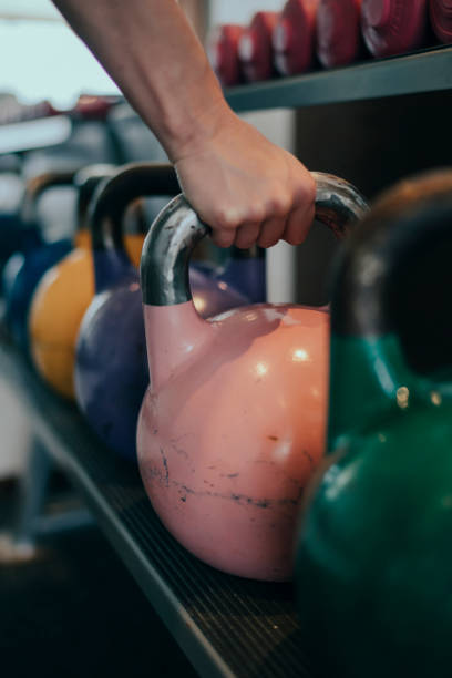 istock Woman grips a kettlebell 1071725474