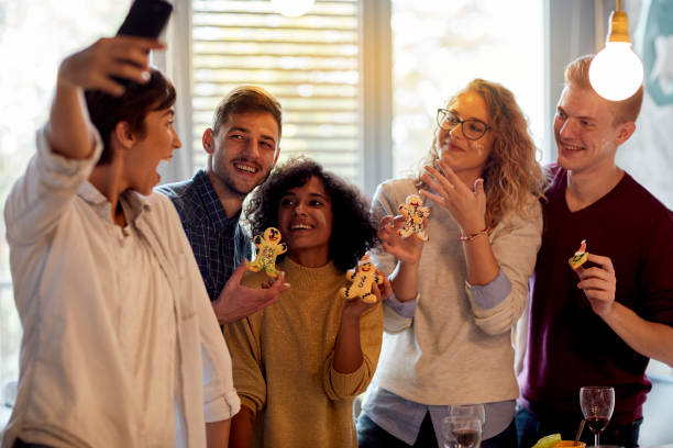 istock Young People Making Ginger Christmas Cookies 1071727084
