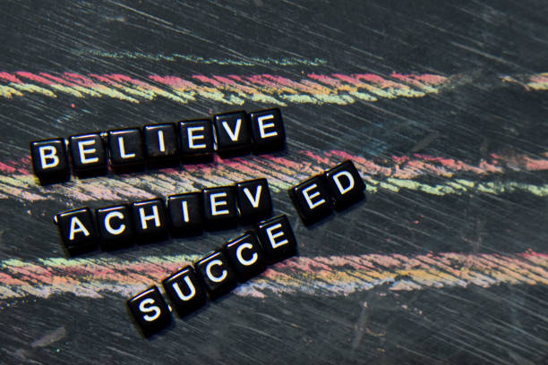 istock Believe Achieved Succeed on wooden blocks. 1071729934