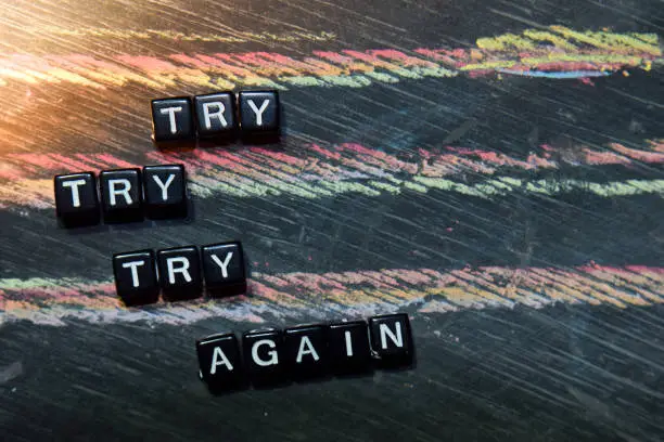 Photo of Try Try Try Again on wooden blocks