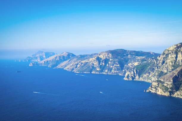 calm mediterranean sea and coast of sorrentine peninsula - sorrentine peninsula imagens e fotografias de stock