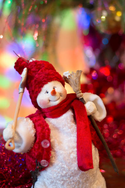 istock Festive happy snowman with Christmas shiny background 1071733512
