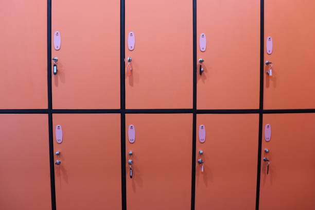 istock Orange locker cabinet in  a locker room 1071740152