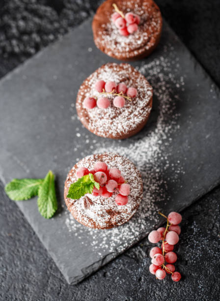 istock Classic chocolate fondant on a dark background. Chocolate muffins 1071746736