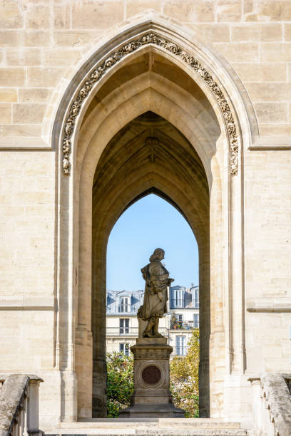 statue of french scientist blaise pascal at the base of saint-jacques tower in paris, france. - church close up paris france gothic style imagens e fotografias de stock