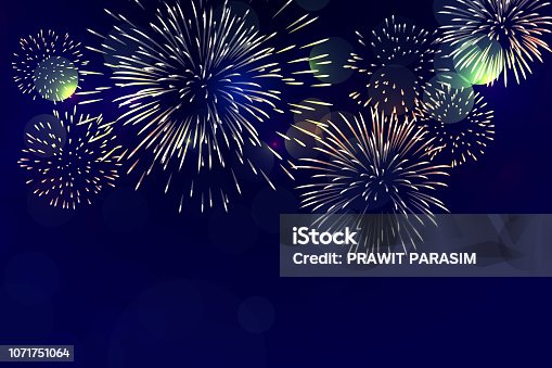 istock Brightly Colorful Fireworks on twilight background 1071751064