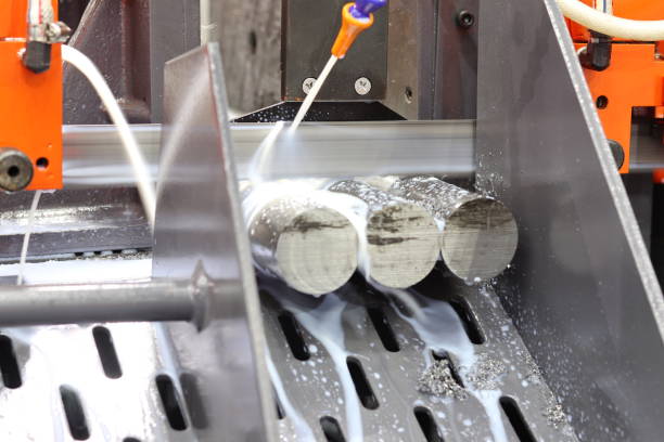 istock Steel bar cutting by band saw machine 1071751288