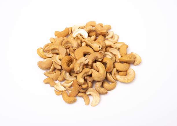 istock Heap of cashew on white background 1071753252