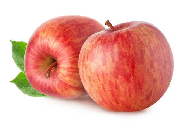 istock Isolated apples. Two red apple fruits with slice (cut) isolated on white with clipping path 1071757756