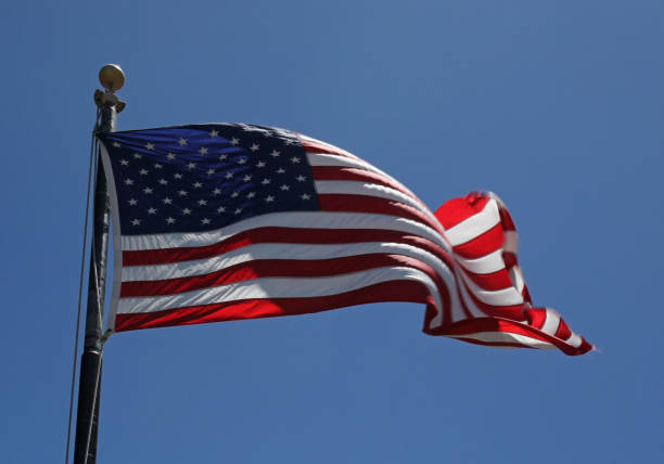 istock American flag waving in the wind 1071763960