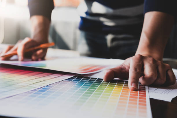 istock corporate designer graphic creative creativity concept ,man using pen to create graphic design coloring colour ideas style house to order customer. 1071770996