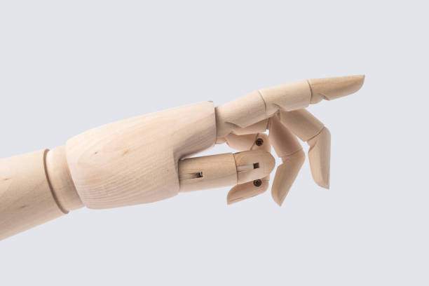 istock wooden hand with start posture isolated on white 1071780522