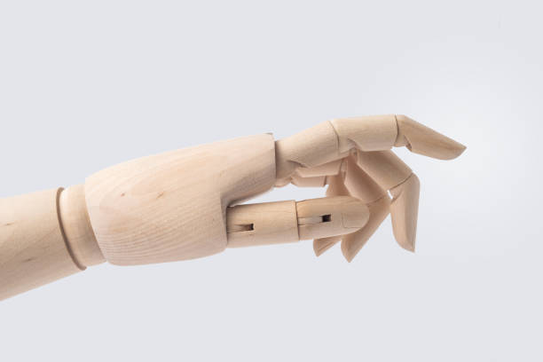 istock wooden hand with start posture isolated on white 1071780662