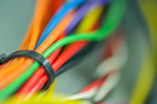 istock bunch of different colorful electrical cable background. 1071789814