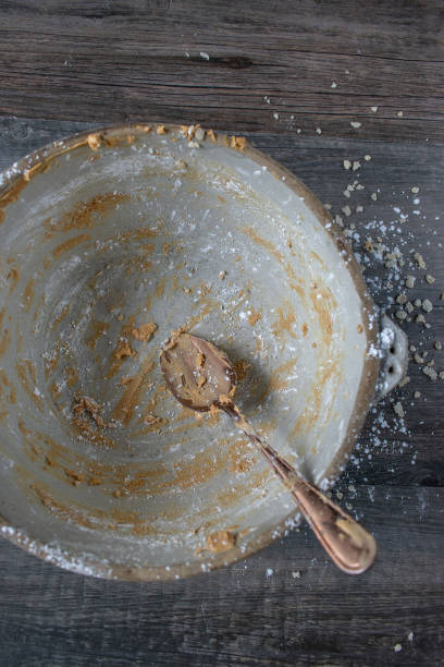 istock Empty mixing bowl with peanut butter remnants 1071795214