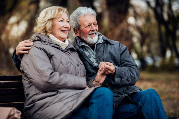 istock Old people resting at the park 1071795216