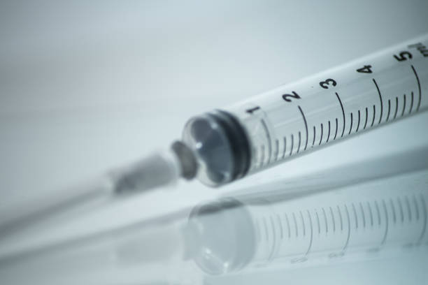 istock Close Up Syringe on a white Background 1071795646