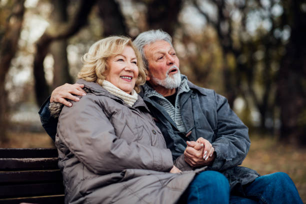 istock Senior couple sitting on the bench 1071795730