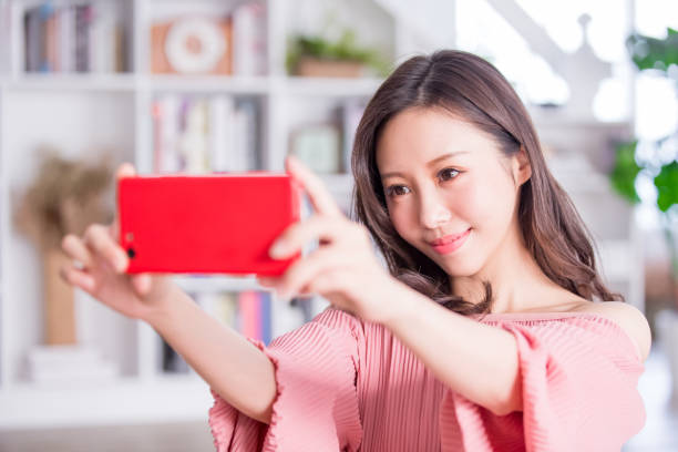 istock Young woman take a selfie 1071796332