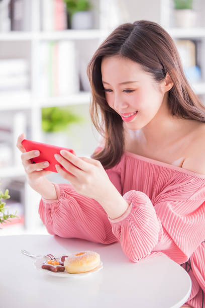 istock woman play mobile game 1071796526