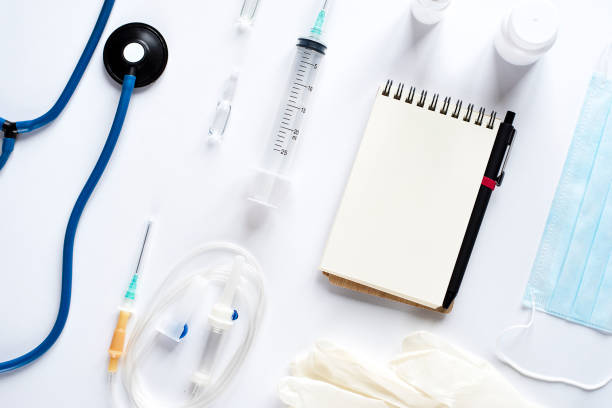 istock Various medical equipment and Notepad on white background 1071798994