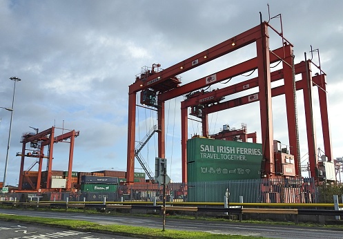 23rd November 2018, Dublin, Ireland. Dublin port container handling gantry crane for lifting goods storage containers from trucks to boats, located in East Wall Road, Dublin Docklands.