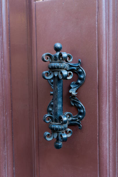 istock Old Clapper on Wooden Old Door. Copy Space 1071812534