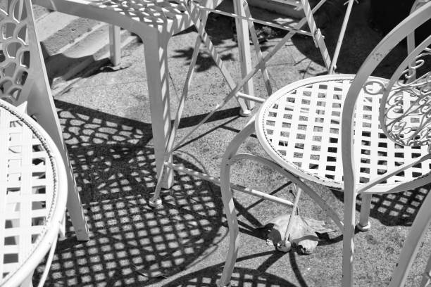 istock Black and white metal chairs in a cafe 1071813074