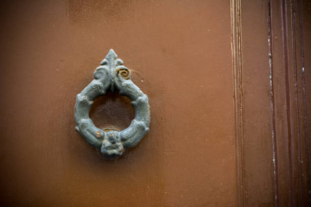 istock Old Clapper on Wooden Old Door. Copy Space 1071819836