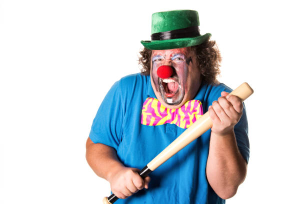 istock Dangerous clown. Funny fat man. 1071820112