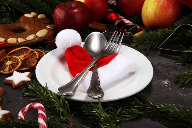 istock Festive table setting for xmas with fork, knife, nuts and apples a christmas dish concept 1071825914