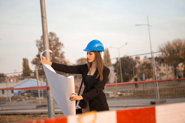 istock A beautiful female engineer is at the construction site 1071833748