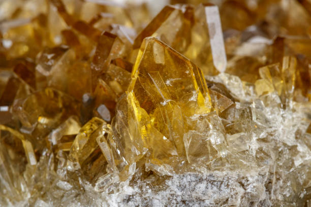 istock Macro mineral stone baryte crystals, Barite on a white background 1071840972