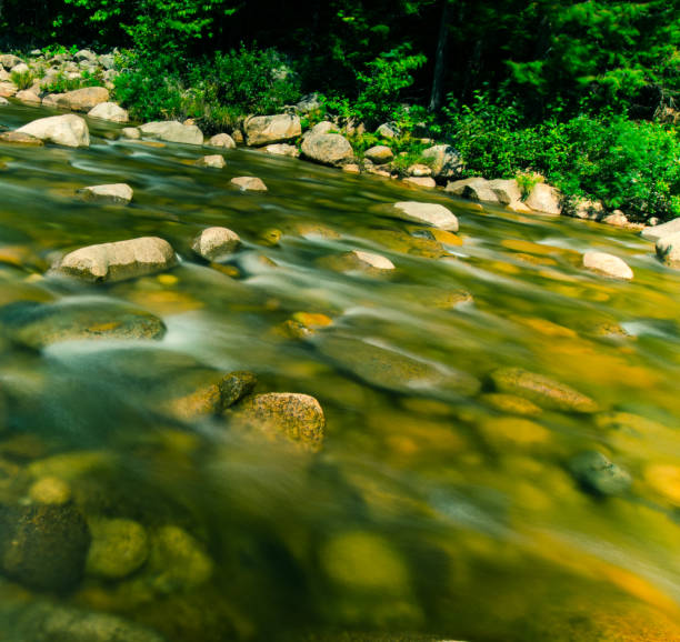 Waters of White Mountain National Park Long exposure of water in White Mountain National Park New Hampshire. loudon stock pictures, royalty-free photos & images