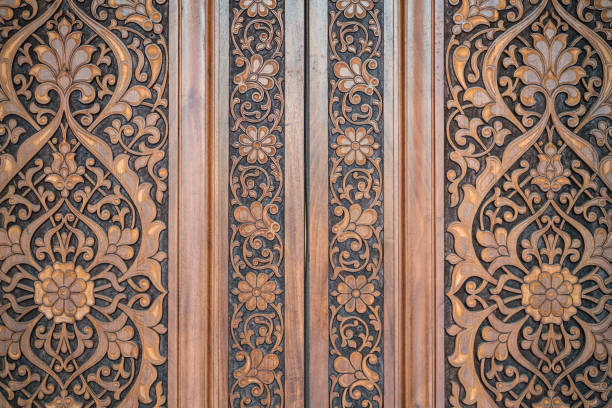 Tashkent, Uzbekistan. A close-up of oriental ornaments with black and gold on a wall