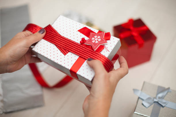 istock Woman Preparing Christmas Presents 1071876474