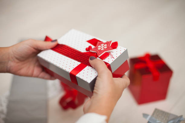 istock Woman Preparing Christmas Presents 1071876478