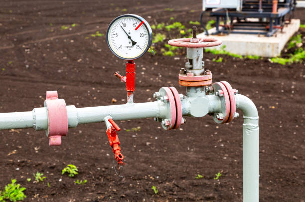 istock Pipeline with control valve and pressure meter 1071889546