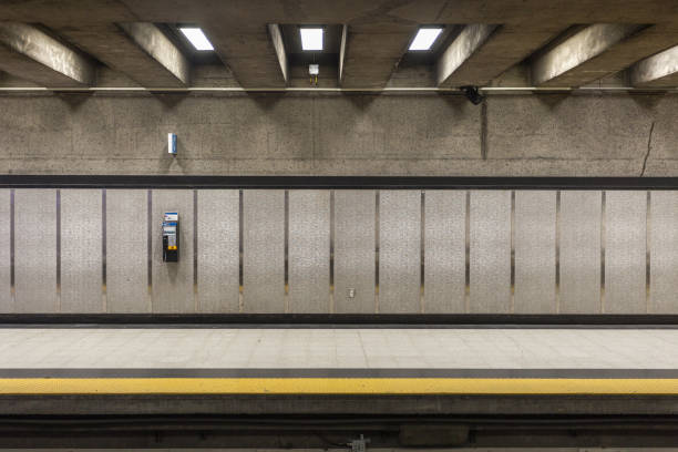 istock A lonely phone attached to tiled wall with ceiling beams 1071898388