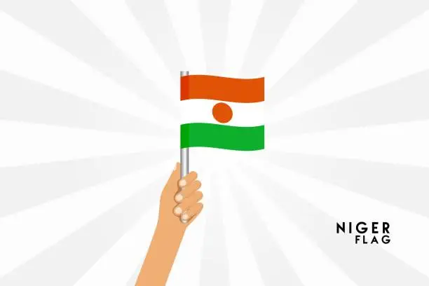 Vector illustration of Vector cartoon illustration of human hands hold Niger flag. Isolated object on white background.